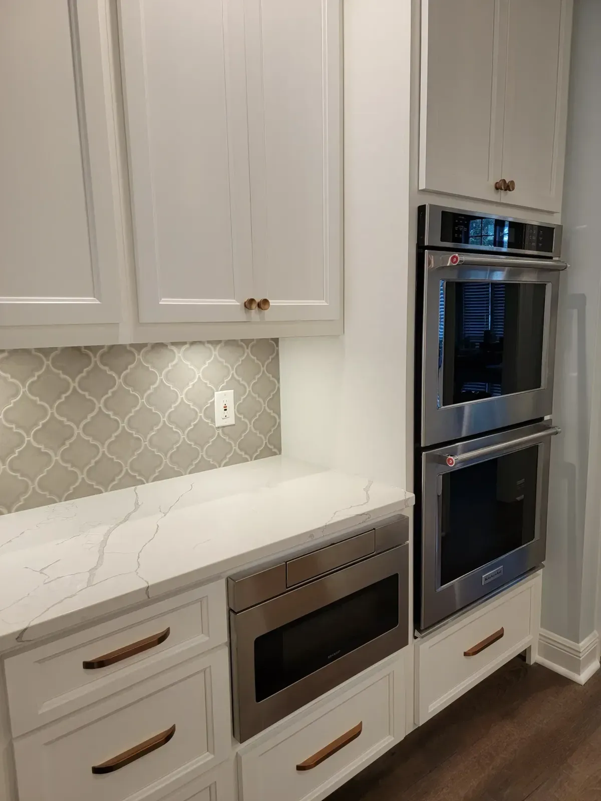 Cabinets around stacked wall ovens