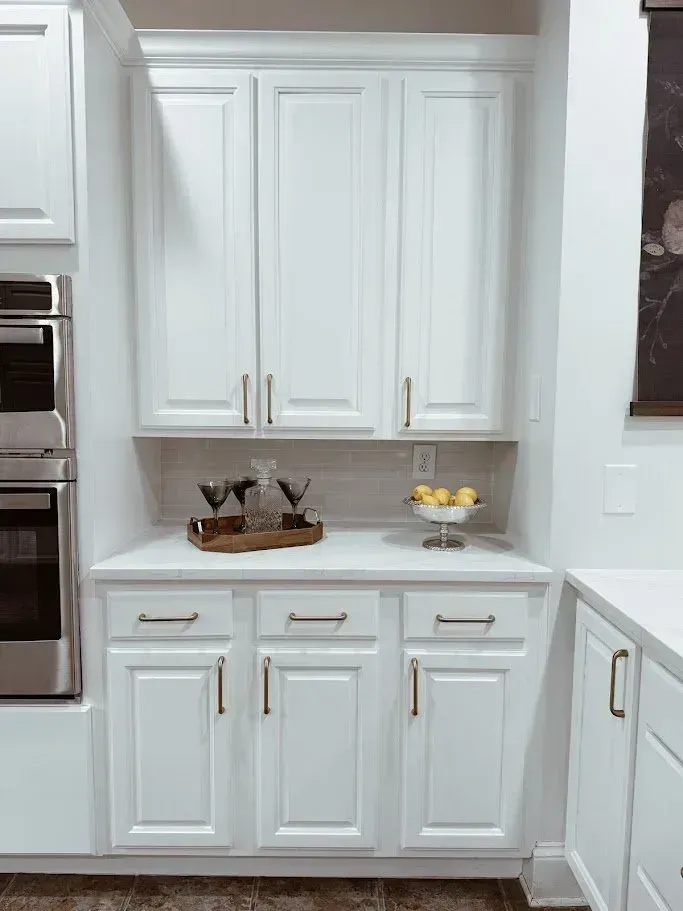 White cabinet tower with glass doors