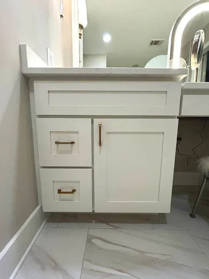 White shaker bathroom vanity with drawers